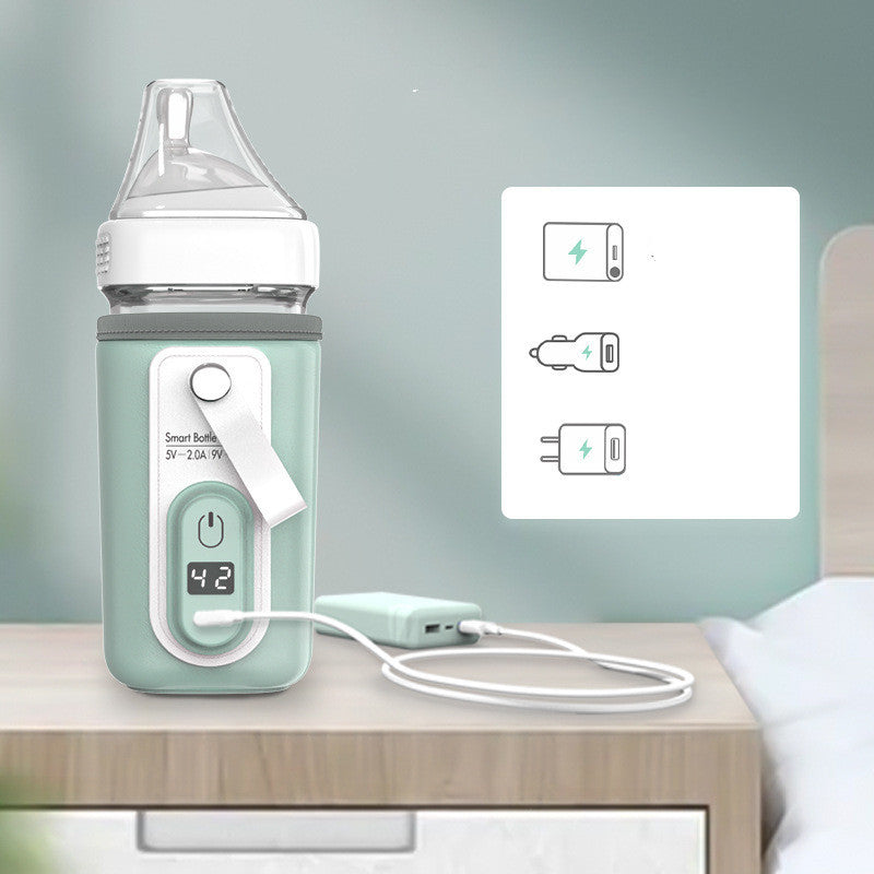 Baby holding smart feeding bottle – safe temperature for infant feeding – sold in USA