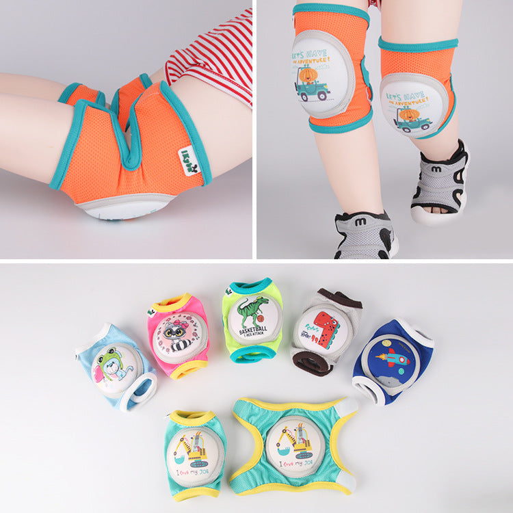 Baby wearing orange and teal knee pads with cartoon print