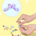 Bright pastel beads in heart, flower, and star shapes for jewelry crafts