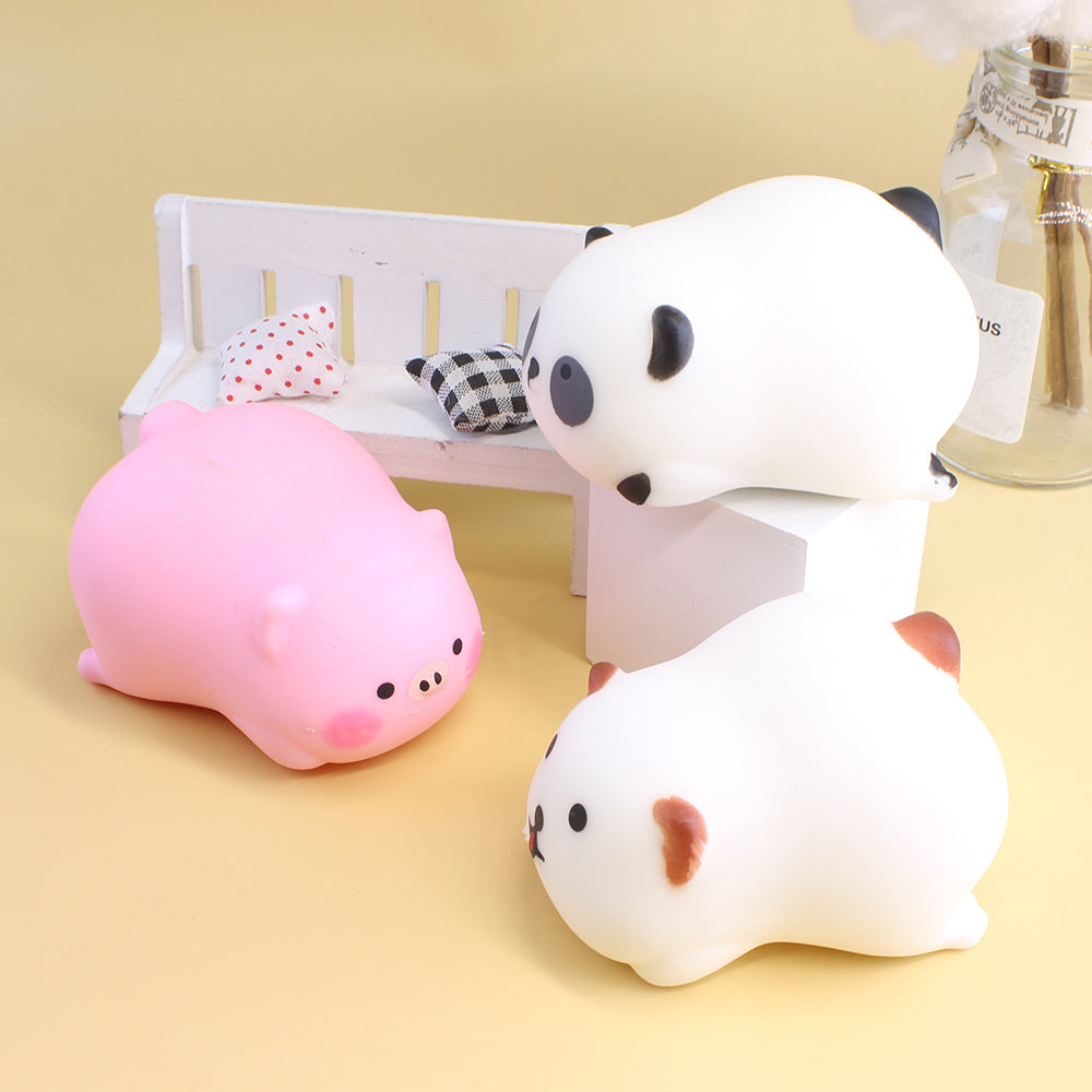 Stacked squishy animals including panda, pig, and white bear