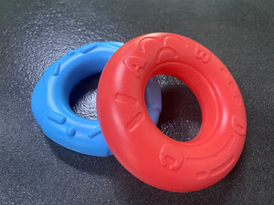 Stacking toy with multi-textured rings for sensory and motor skill development
